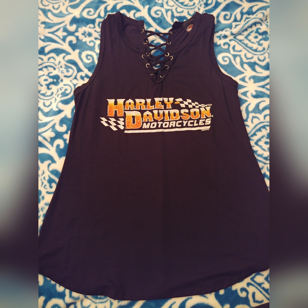 NWOT Tags. Harley Davidson tank top. Embellishments, tie front and back. Size Lg
